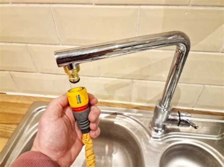 How do you connect a hose to an outside faucet?