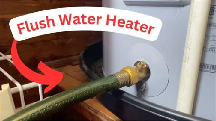 How do you get water out of a water heater pan?