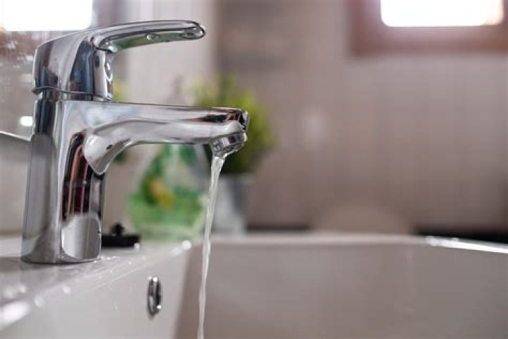 What causes low pressure in bathroom faucet?