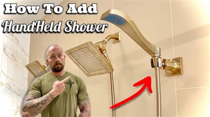 What connects the shower head to the wall?